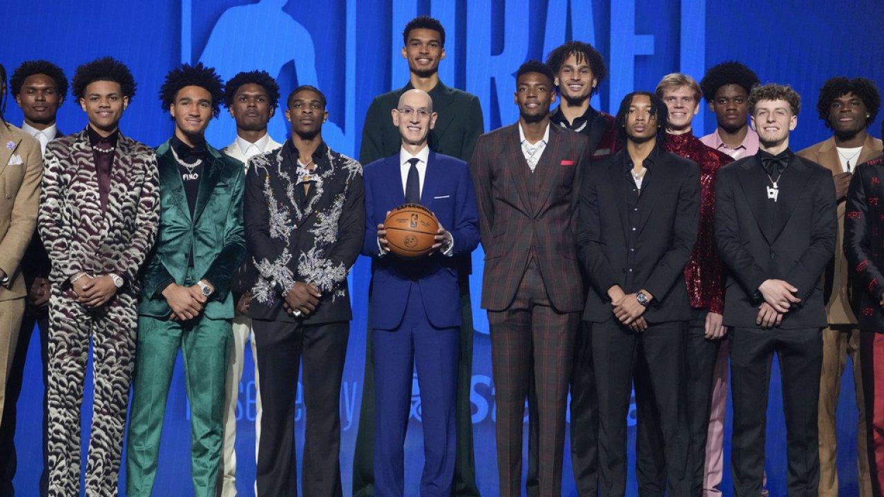 NBA Commissioner Adam Silver, center, stands for a photo with potential first-round NBA draft picks.