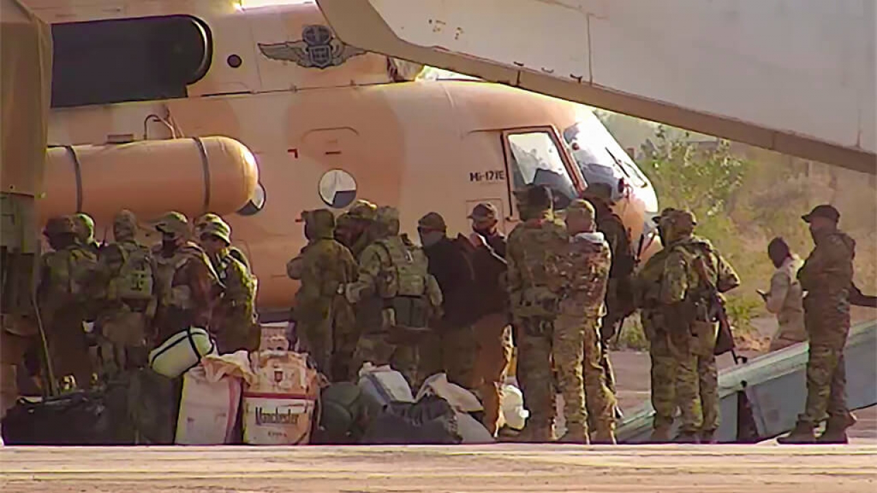 Russian mercenaries boarding a helicopter in northern Mali
