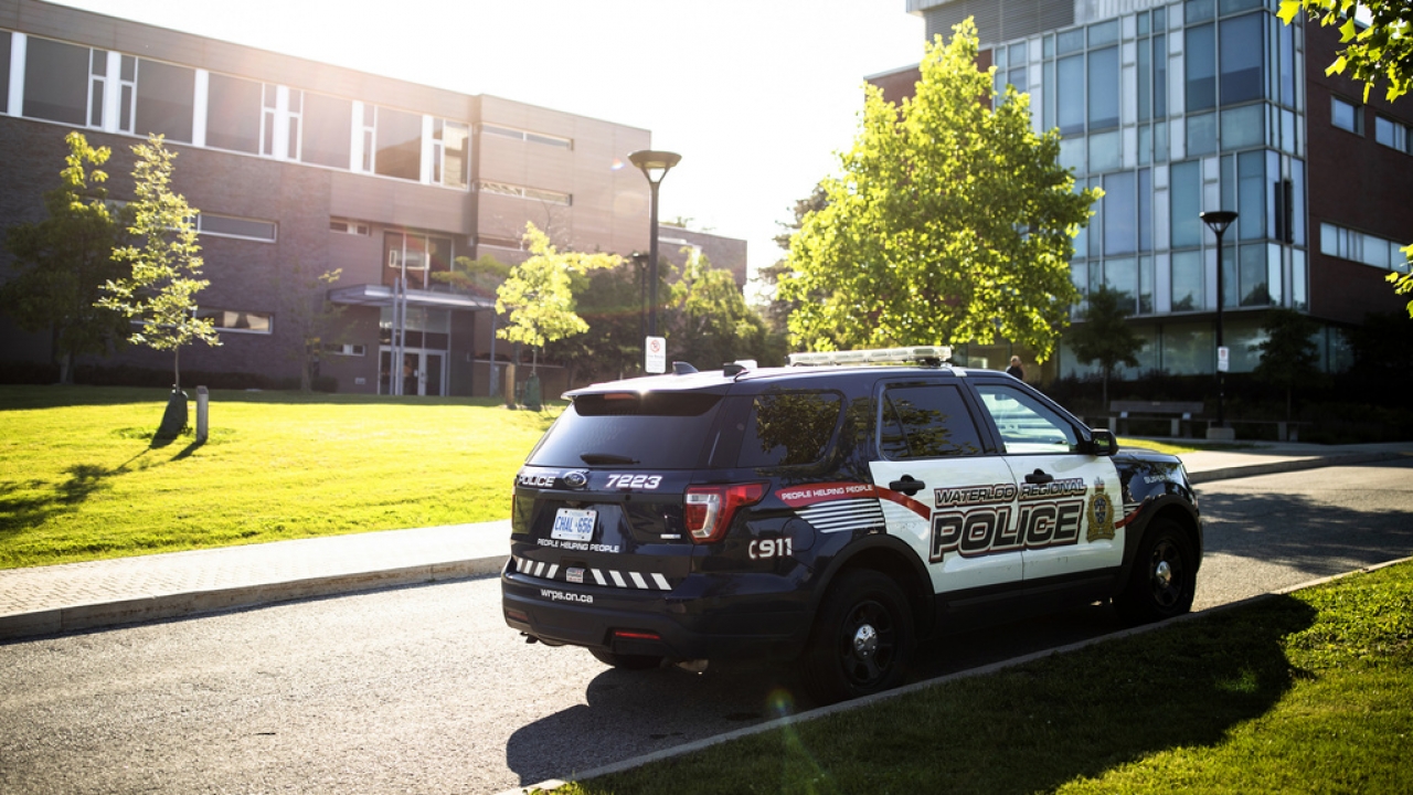A Waterloo Regional Police vehicle is parked near the scene of a stabbing at the University of Waterloo.