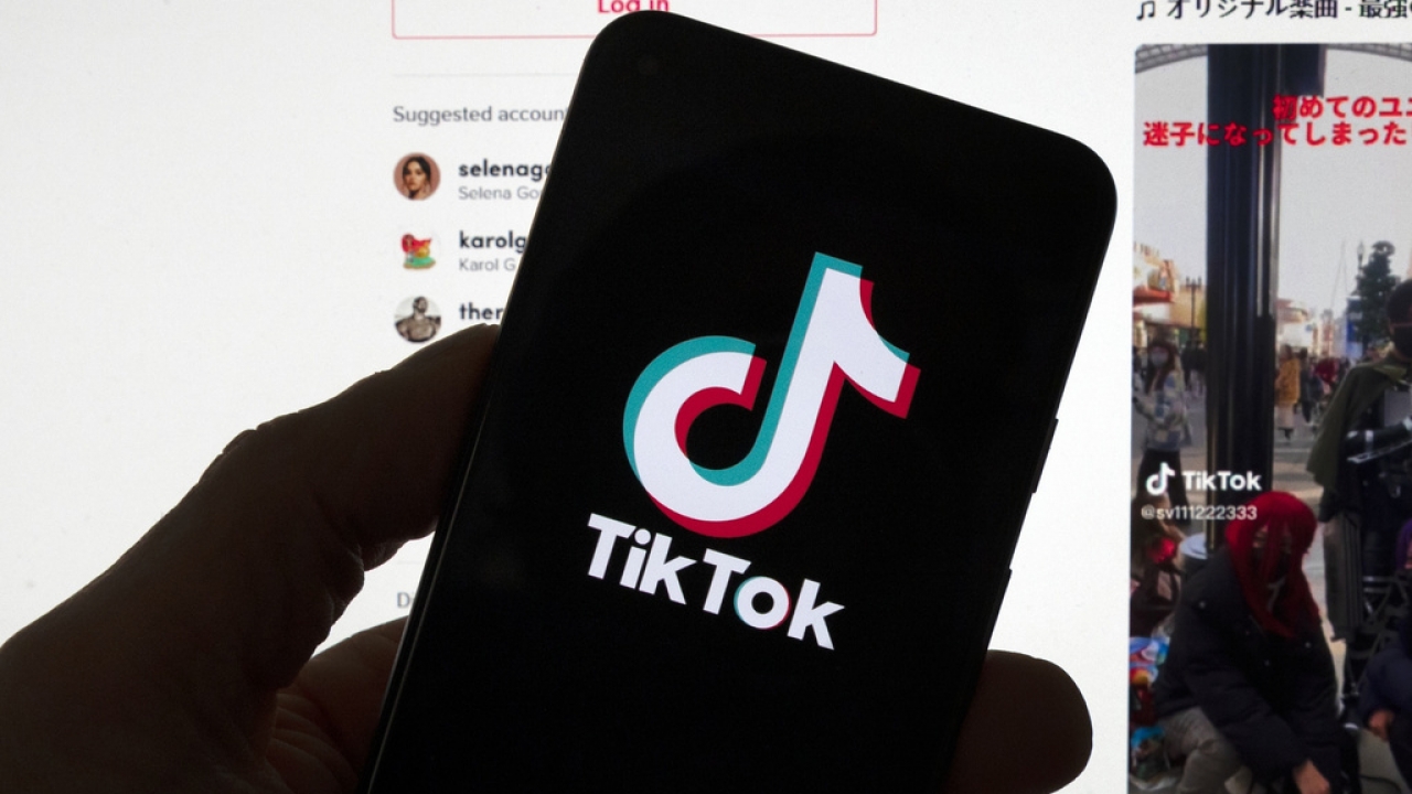 Phone displays TikTok logo