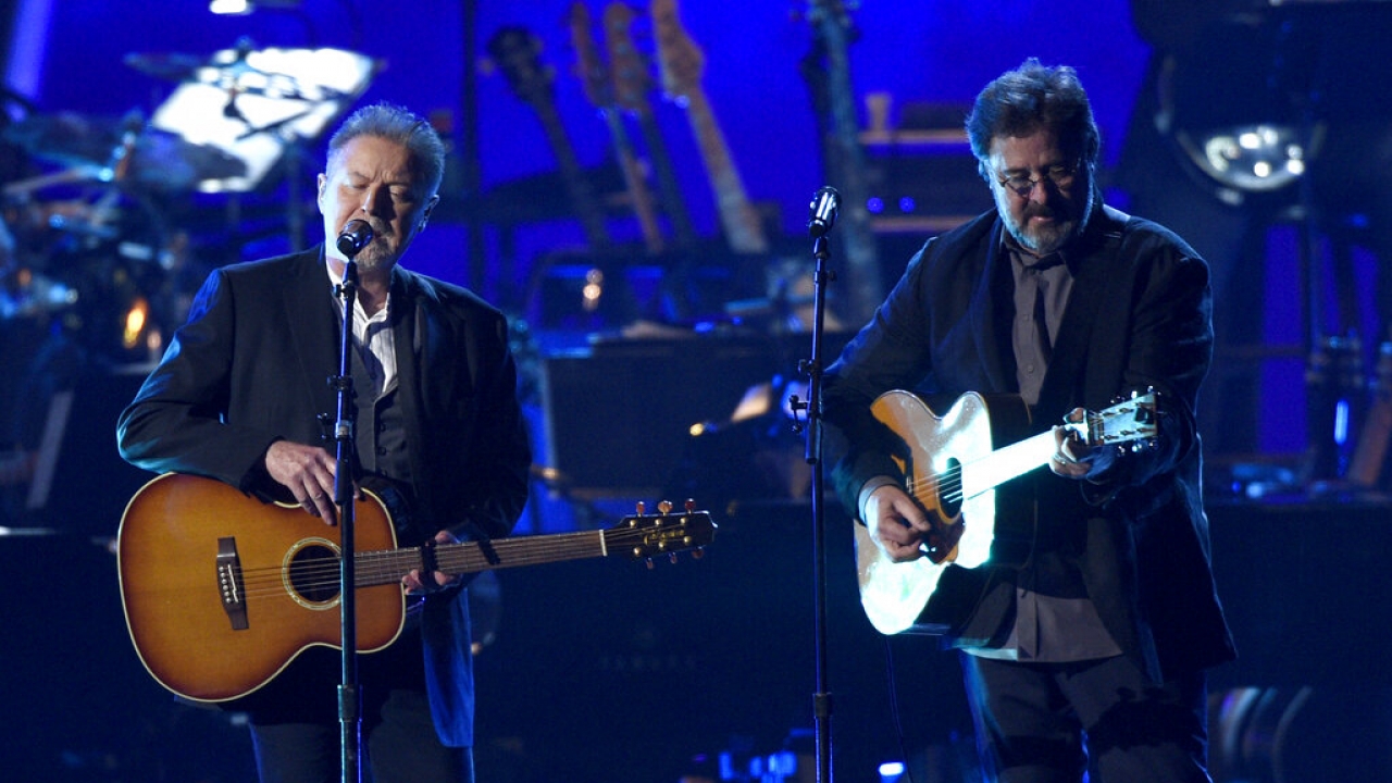Don Henley and Vince Gill perform.