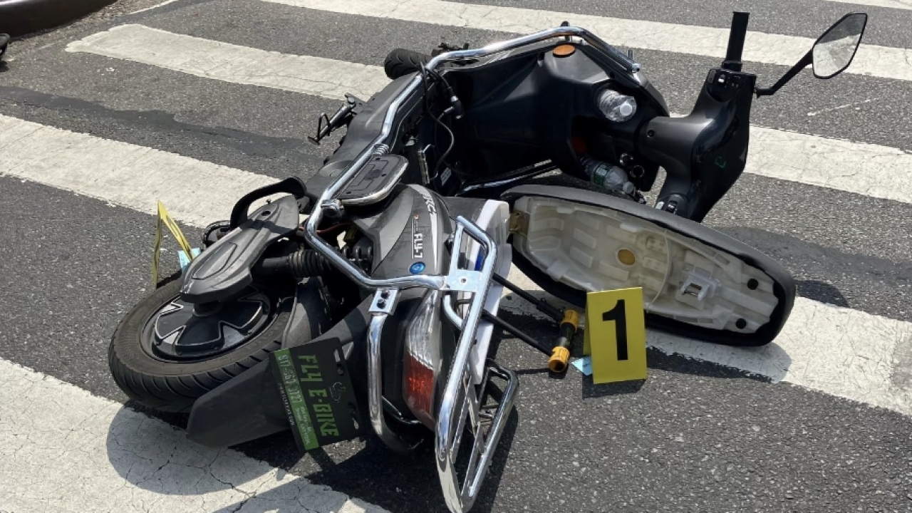 A scooter lay on the street that was used by a shooter in NYC