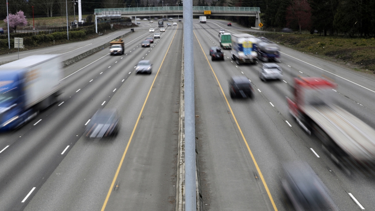 Cars and trucks travel on Interstate 5 near Olympia, Washington.