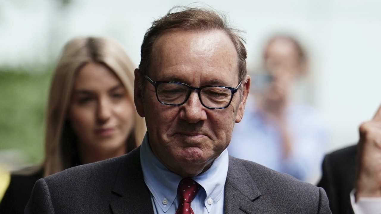 Actor Kevin Spacey leaves a London court.