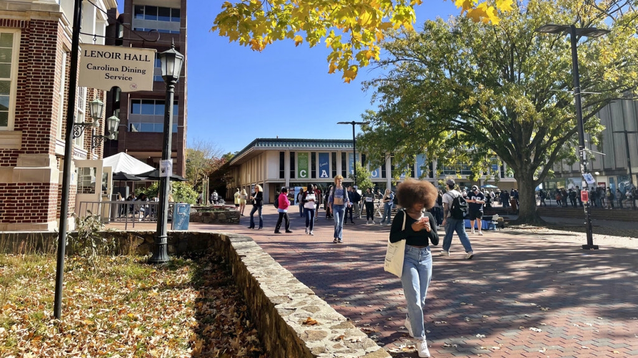 Students walk through the quad outside the student union at the University of North Carolina at Chapel Hill.