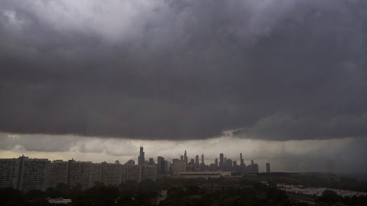 Storm clouds pass over downtown Chicago and the Bronzeville neighborhood of the city.