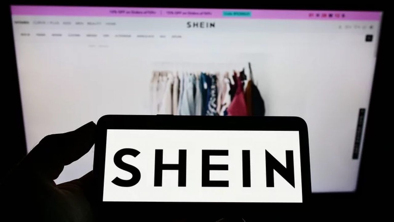 A person looks at Shein.