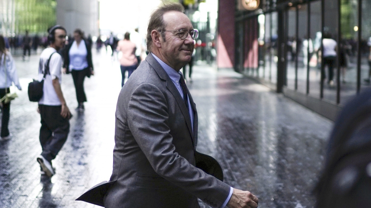 Actor Kevin Spacey walks outside of a London court.