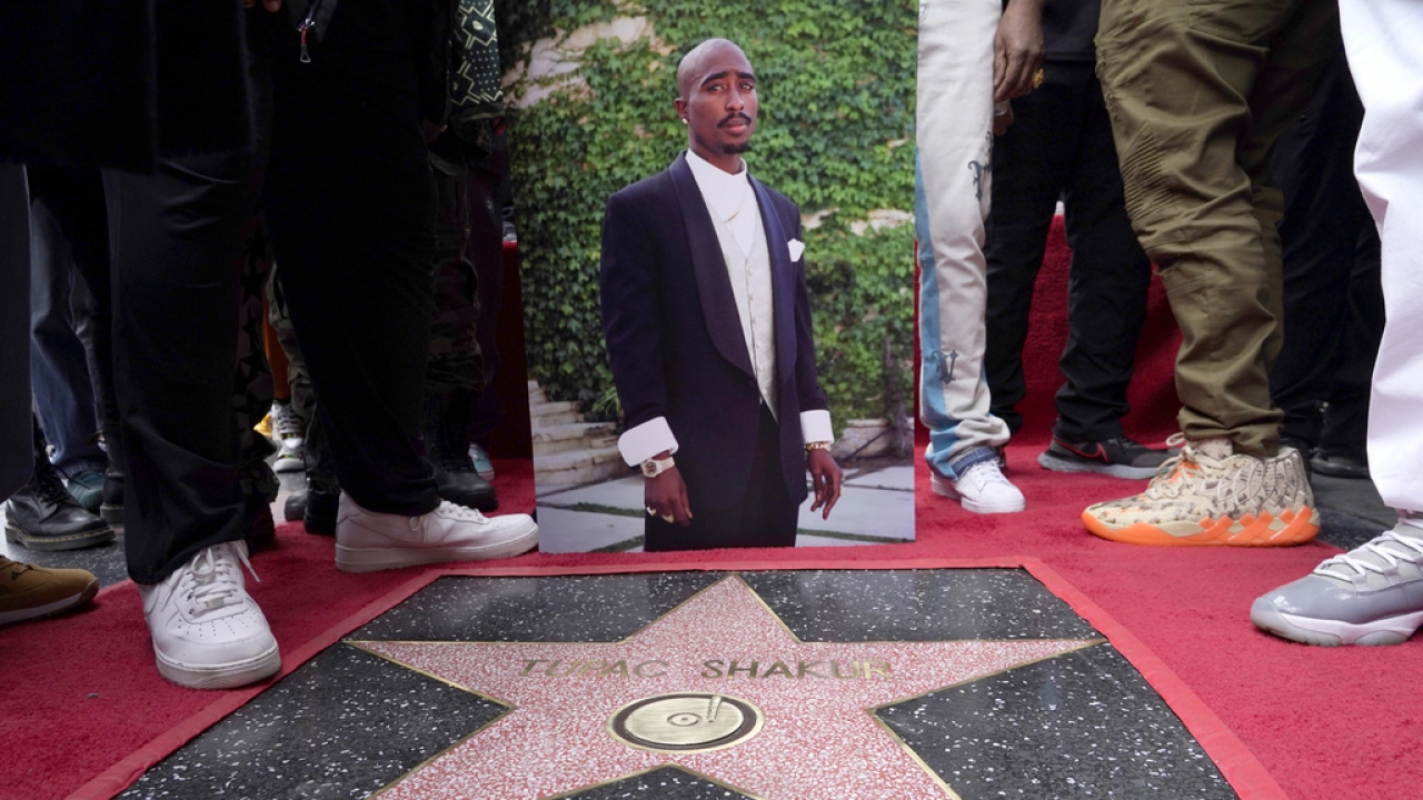 Photo of rapper Tupac Shakur near his Hollywood Walk of Fame star.