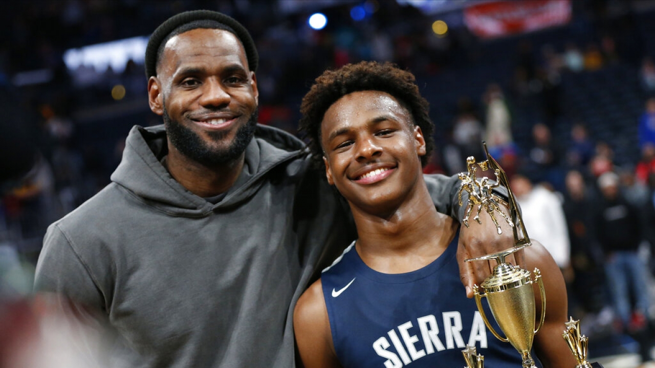 LeBron James, left, poses with his son Bronny after Sierra Canyon beat Akron St. Vincent - St. Mary.