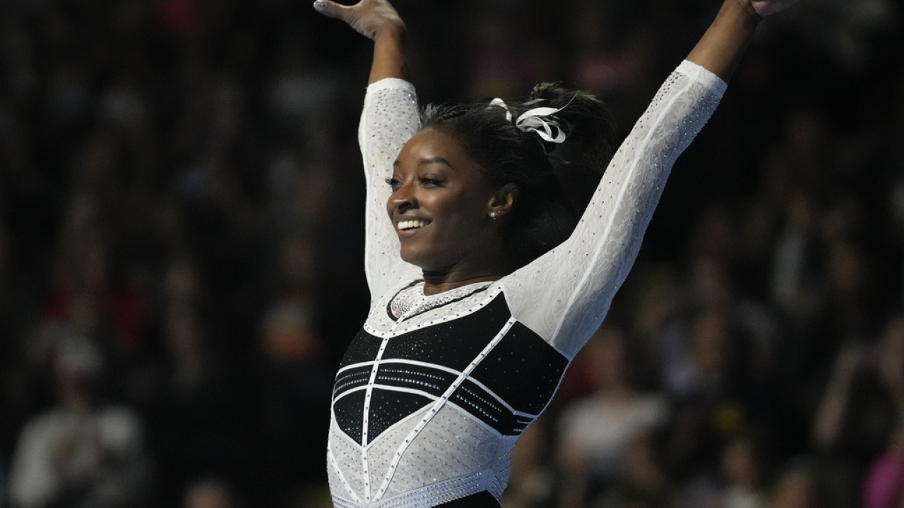 Simone Biles reacts after performing in the floor exercise at the U.S. Classic gymnastics competition