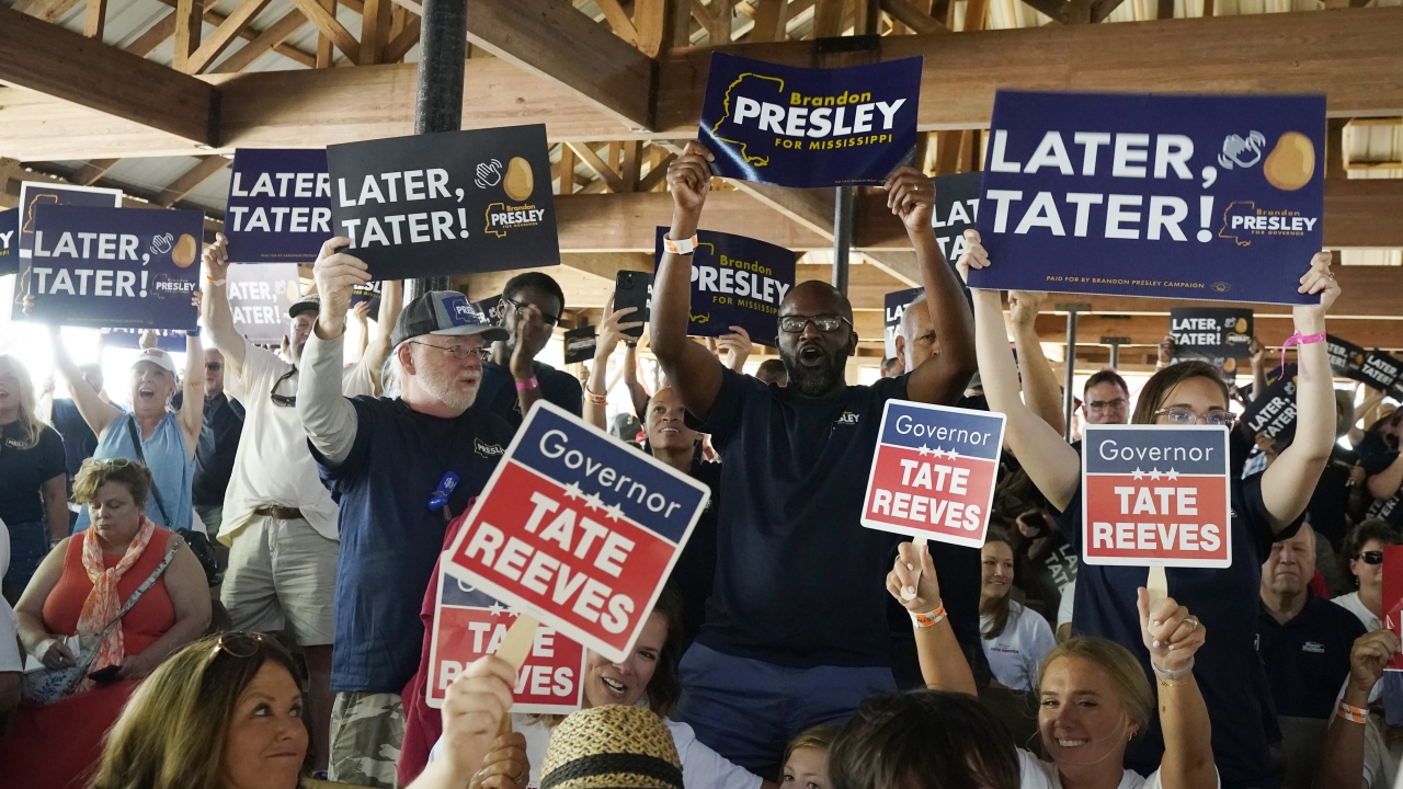 Contrasting groups of supporters for the incumbent Mississippi Gov. Tate Reeves and Democrat Brandon Presley.