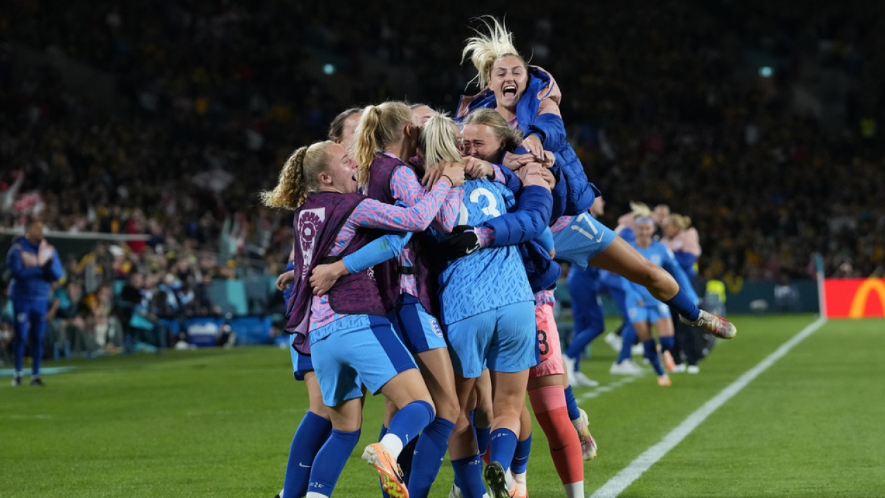 England's team players celebrate after Alessia Russo scored.