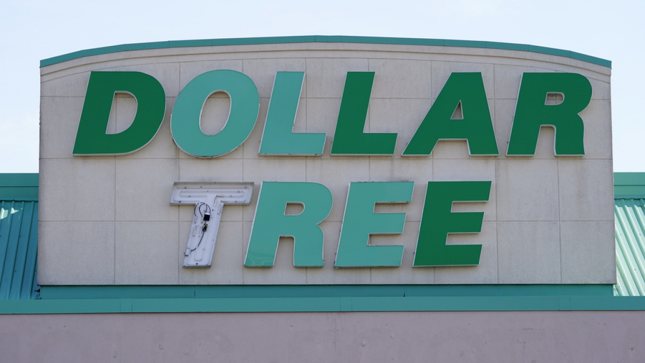 A sign hangs above a Dollar Tree store