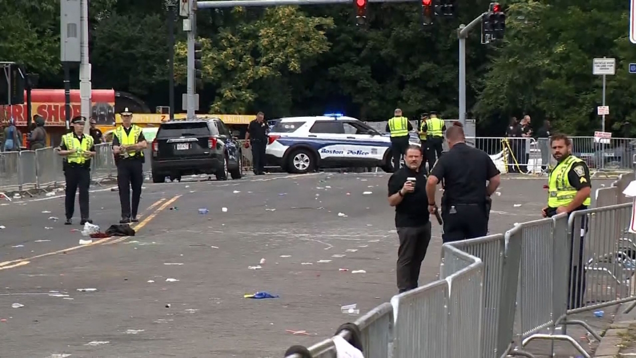 Police at the scene of a shooting at a Caribbean parade in Boston.