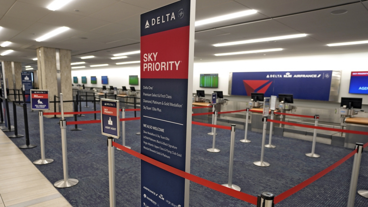 The Delta Airlines ticket area is deserted Tuesday, Aug. 29, 2023, at the Tampa International Airport in Tampa, Fla.