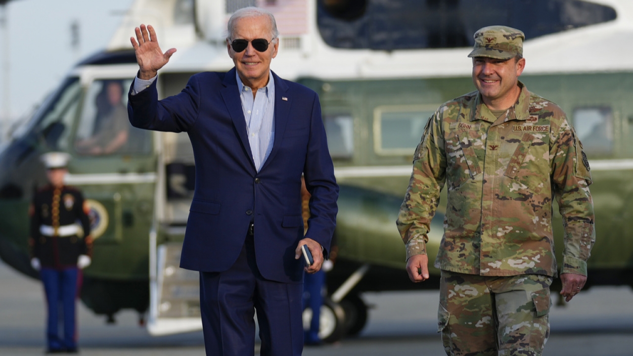 President Joe Biden walks from Marine One to board Air Force One