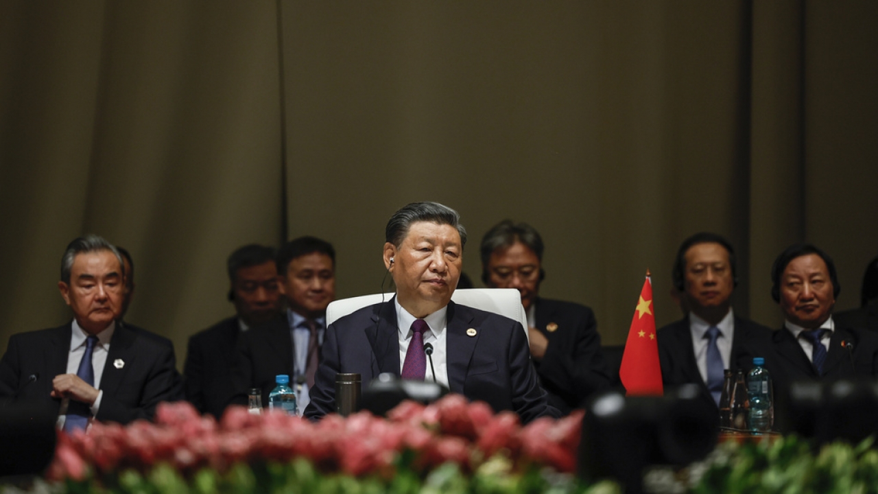 China's President Xi Jinping is shown.
