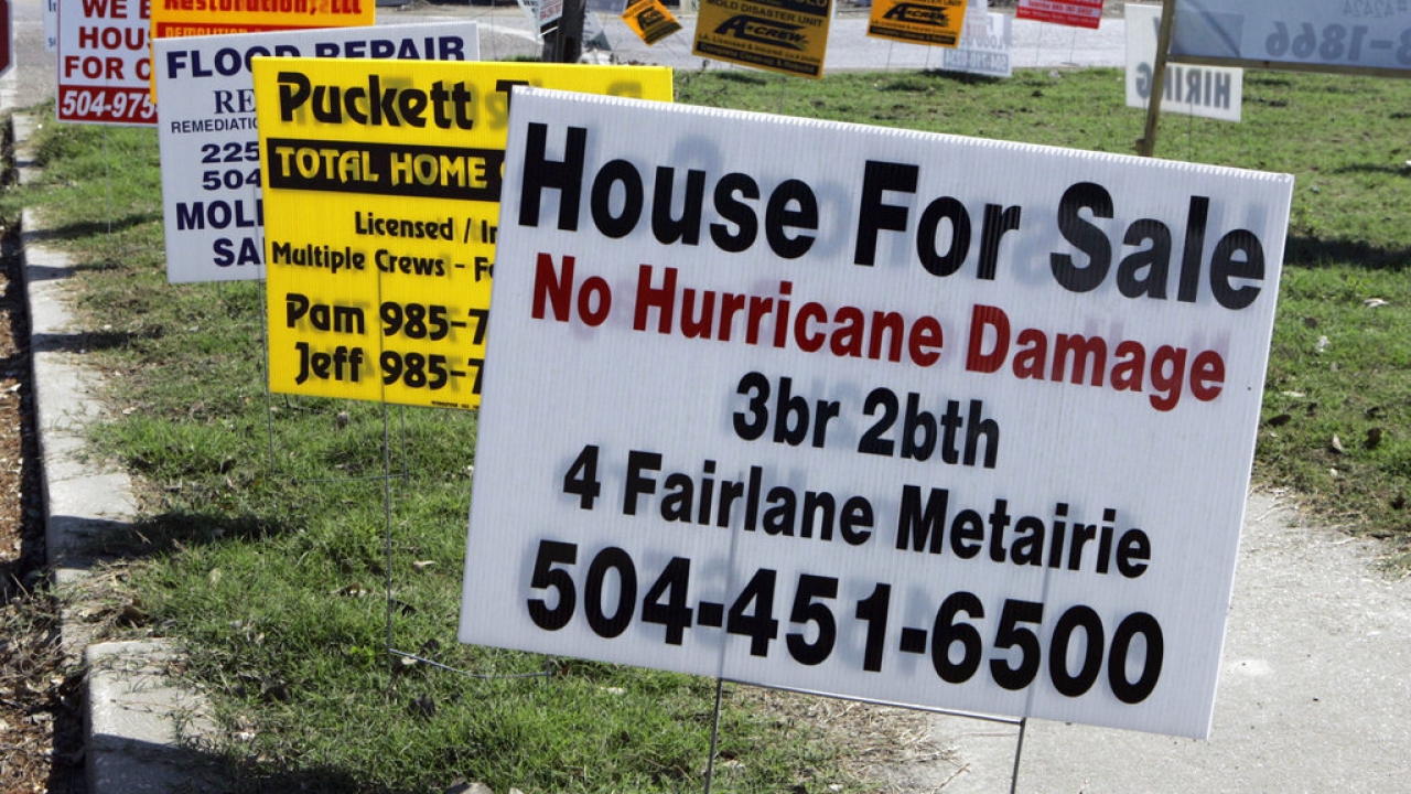 A house for sale is advertised in New Orleans, touting "no hurricane damage"