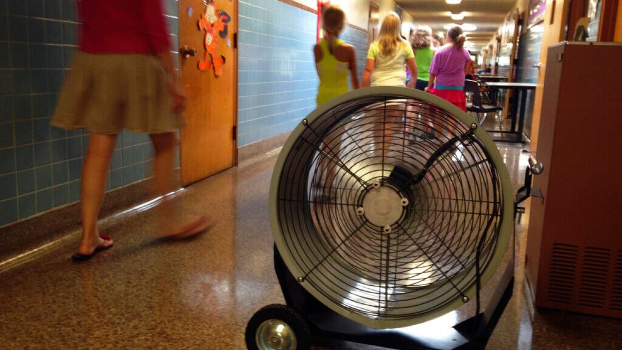 A school in Illinois uses a fan in the hallway for extra cooling