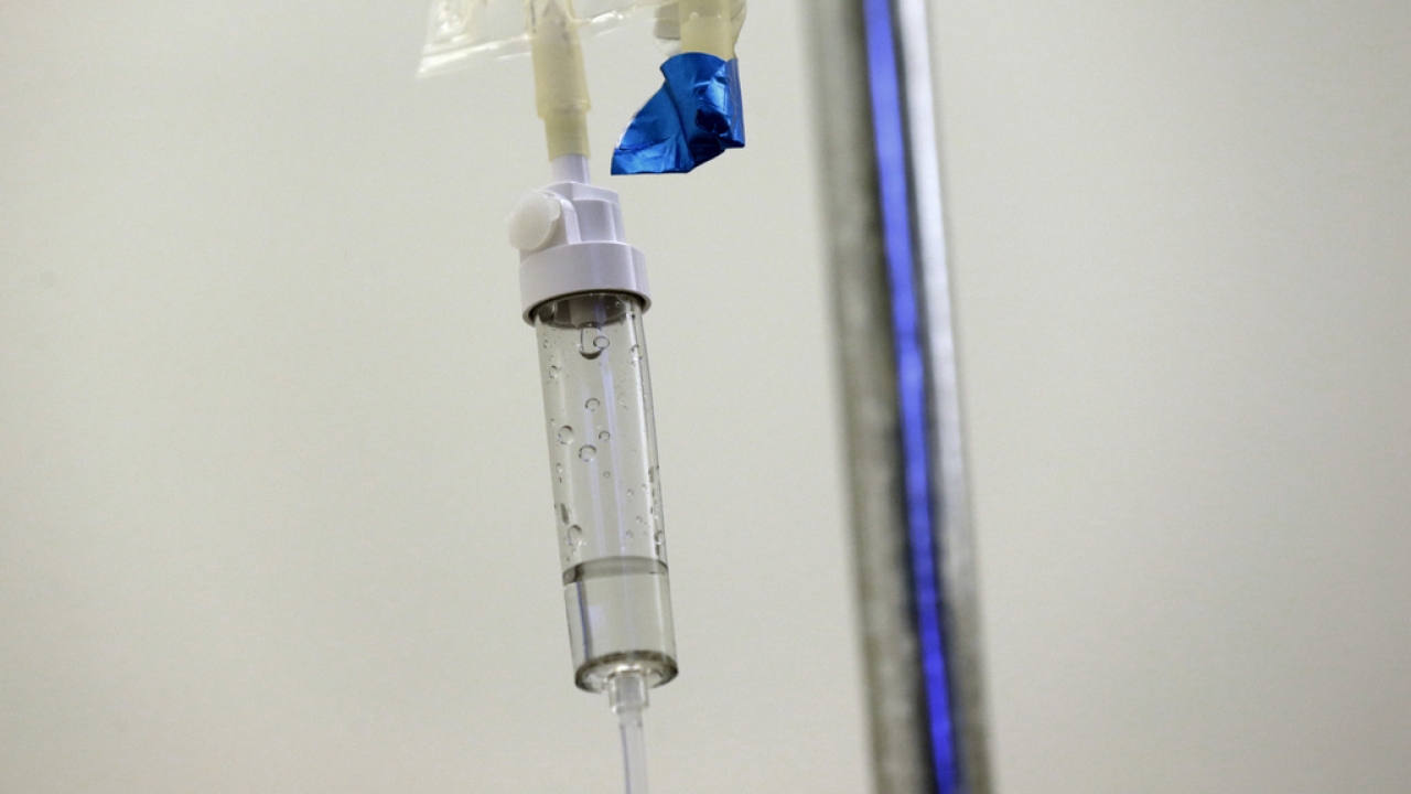 Chemotherapy drugs are administered to a patient.