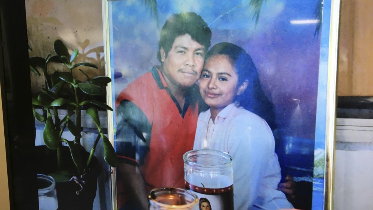 Framed photo of Ismael Lopez, left, and his wife Claudia.