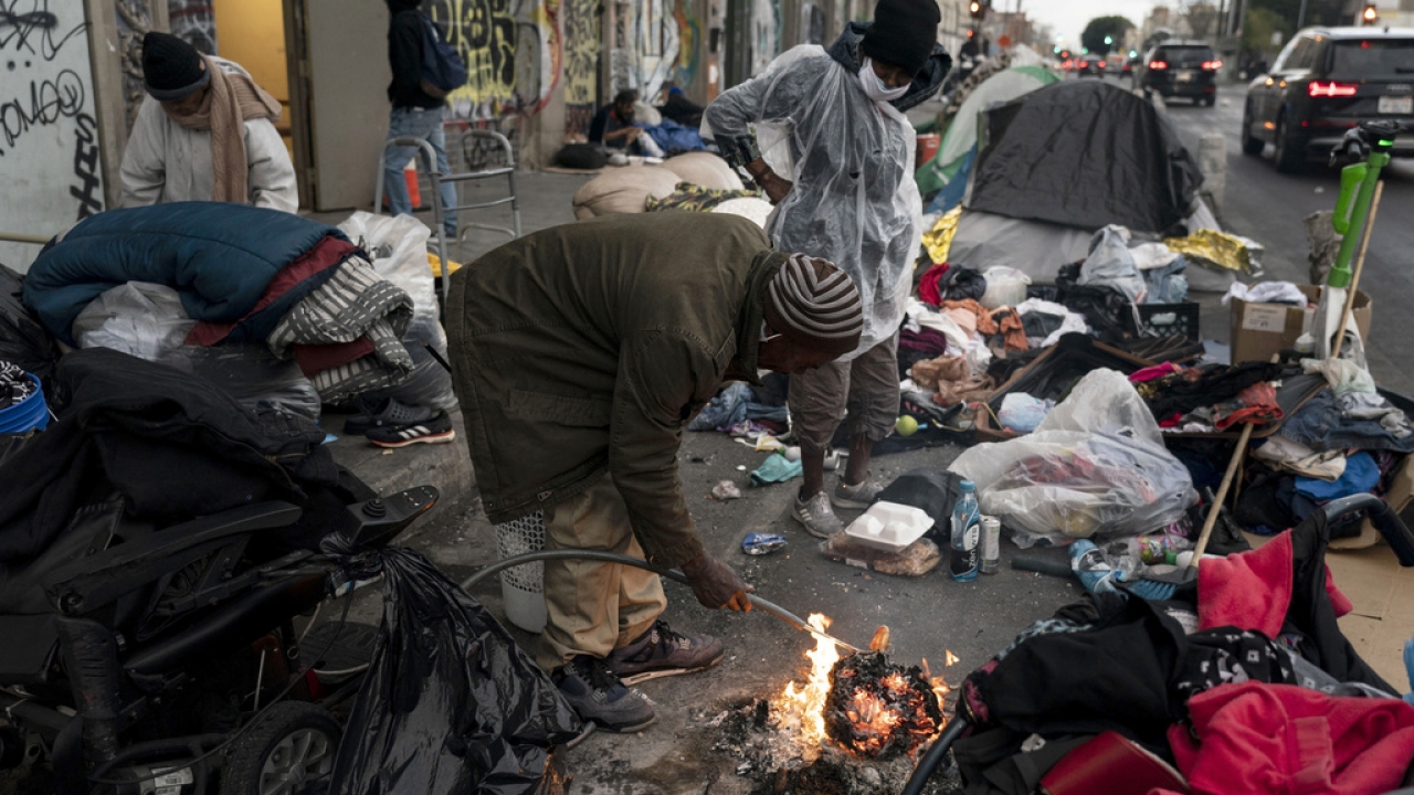 A street encampment of people experiencing homelessness in California.