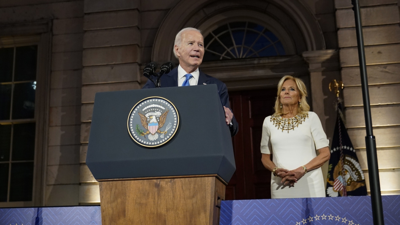 President Joe Biden speaks from a podium at the Metropolitan Museum of Art.