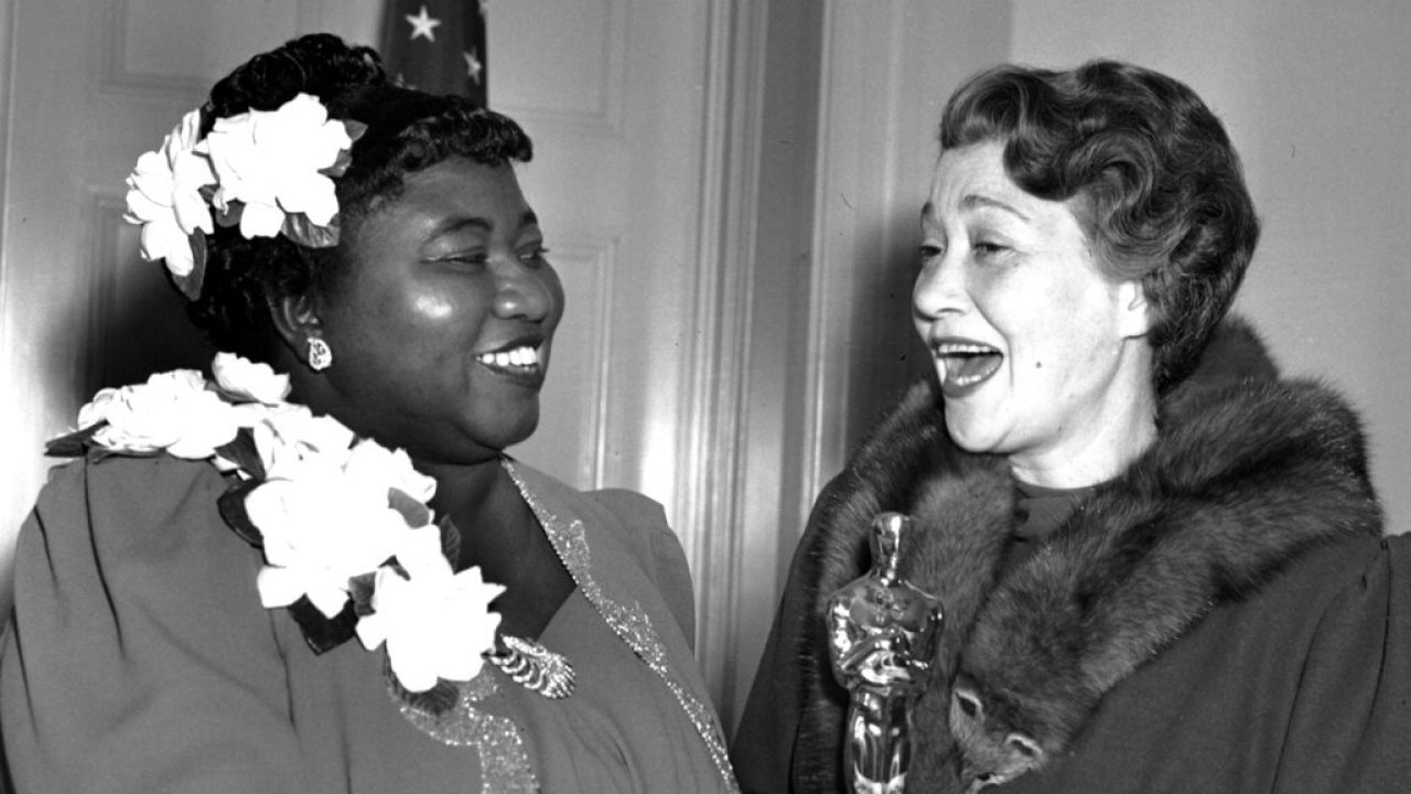 Hattie McDaniel, left, was given the Motion Picture Academy award.