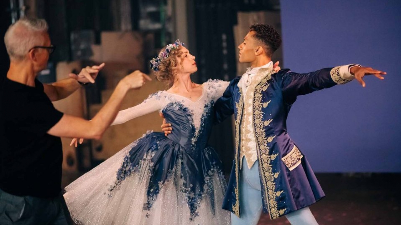 Ballet performers dressed in costumes to depict the story of "Cinderella"