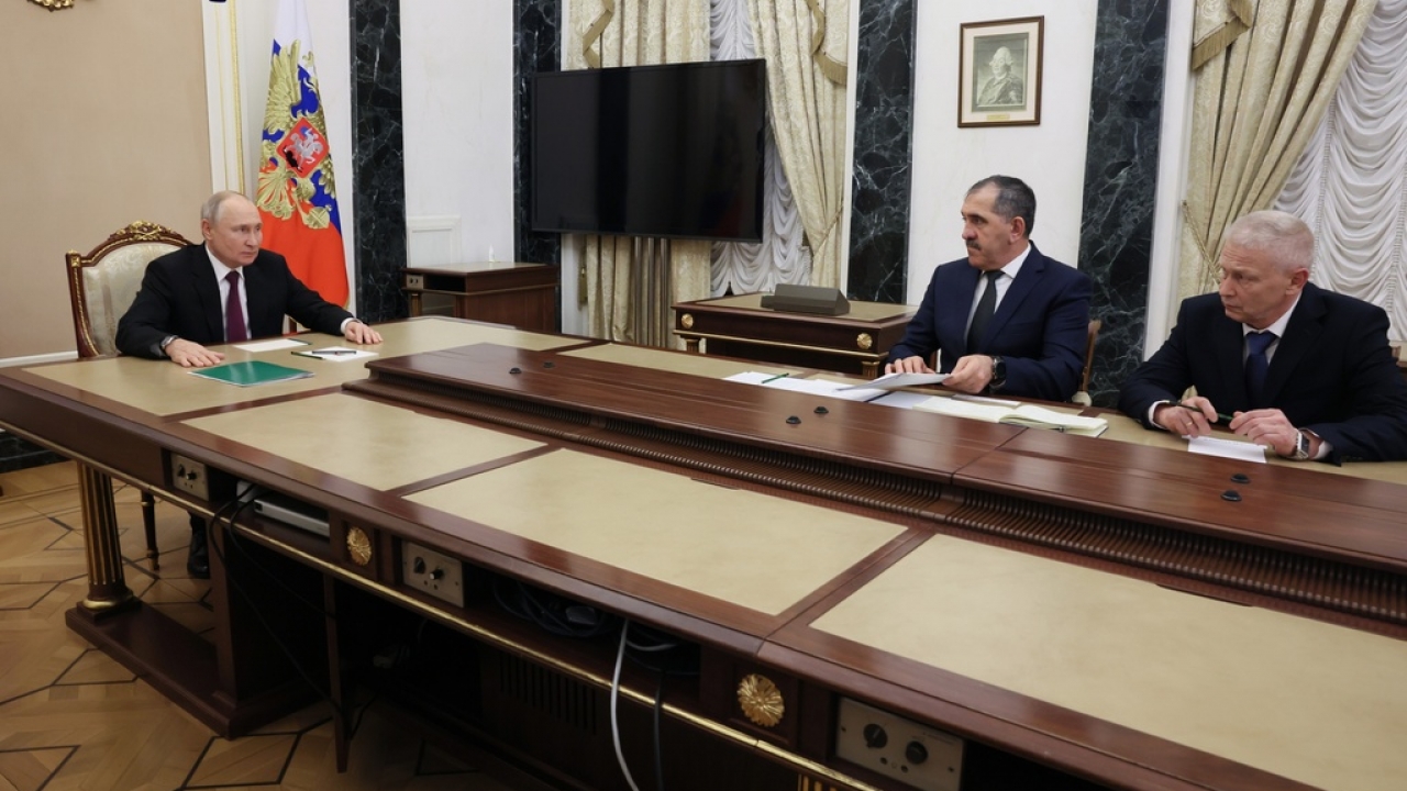Russian President Vladimir Putin meets with officials.
