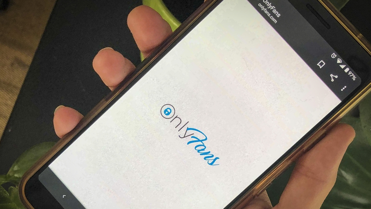 This photo shows a phone app for OnlyFans, a site where fans pay creators for their photos and videos, Thursday Aug. 19, 2021