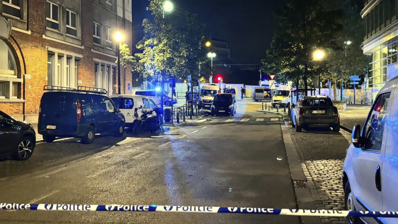 Police cordon off an area where a shooting took place in the center of Brussels.