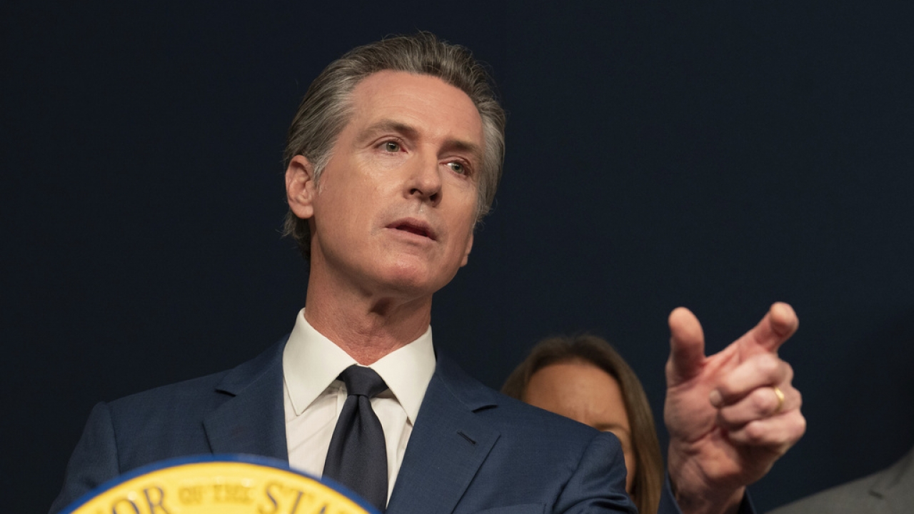 California Gov. Gavin Newsom answers questions during a news conference