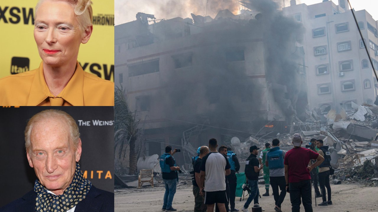 Tilda Swinton and Charles Glass are pictured next to a photo in Gaza.