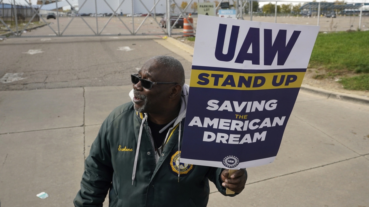 Dave Ratliff, a United Auto Workers member, walks the picket line during a strike at a Stellantis plant.