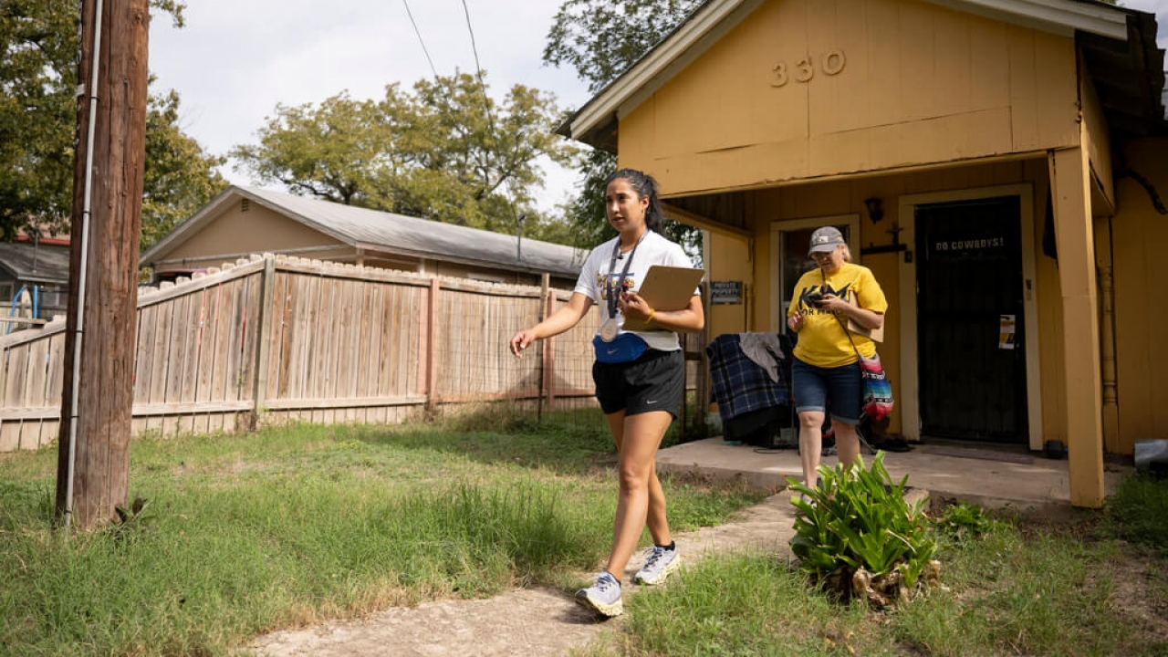 Uvalde mayoral candidate Kimberly Mata-Rubio canvasses a neighborhood in support of her campaign.