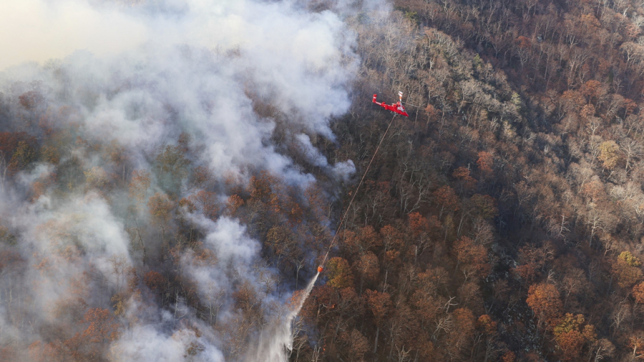 Firefighters trying to stop the western spread of the Quaker Run Wildfire in Madison County, Va.