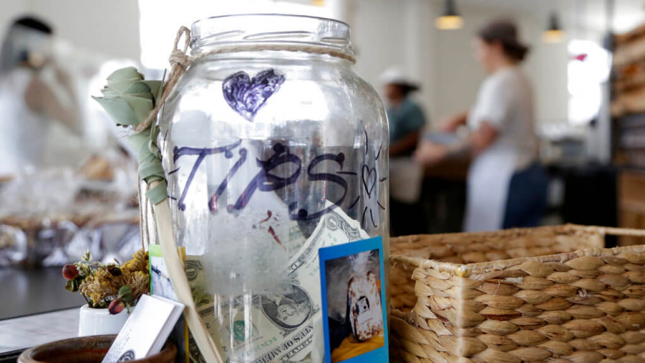 A tip jar on a counter