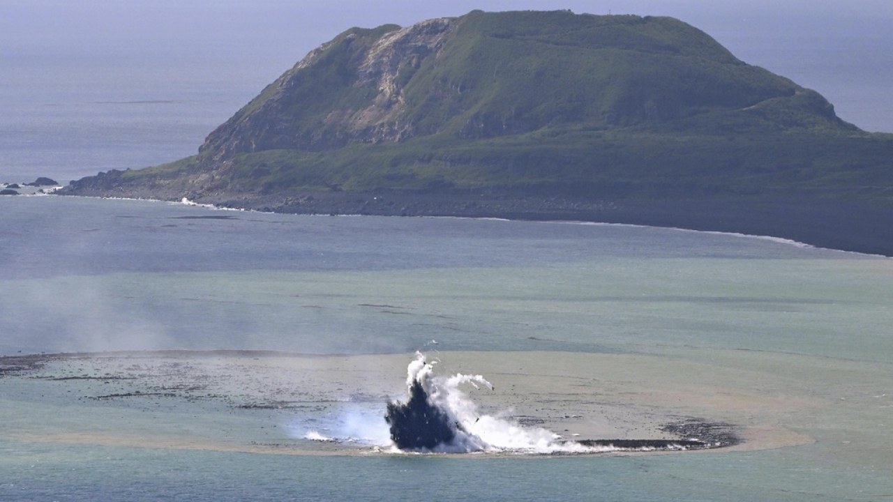 This aerial photo shows steam billowing from the waters off Iwoto Island, Ogasawara town in the Pacific Ocean