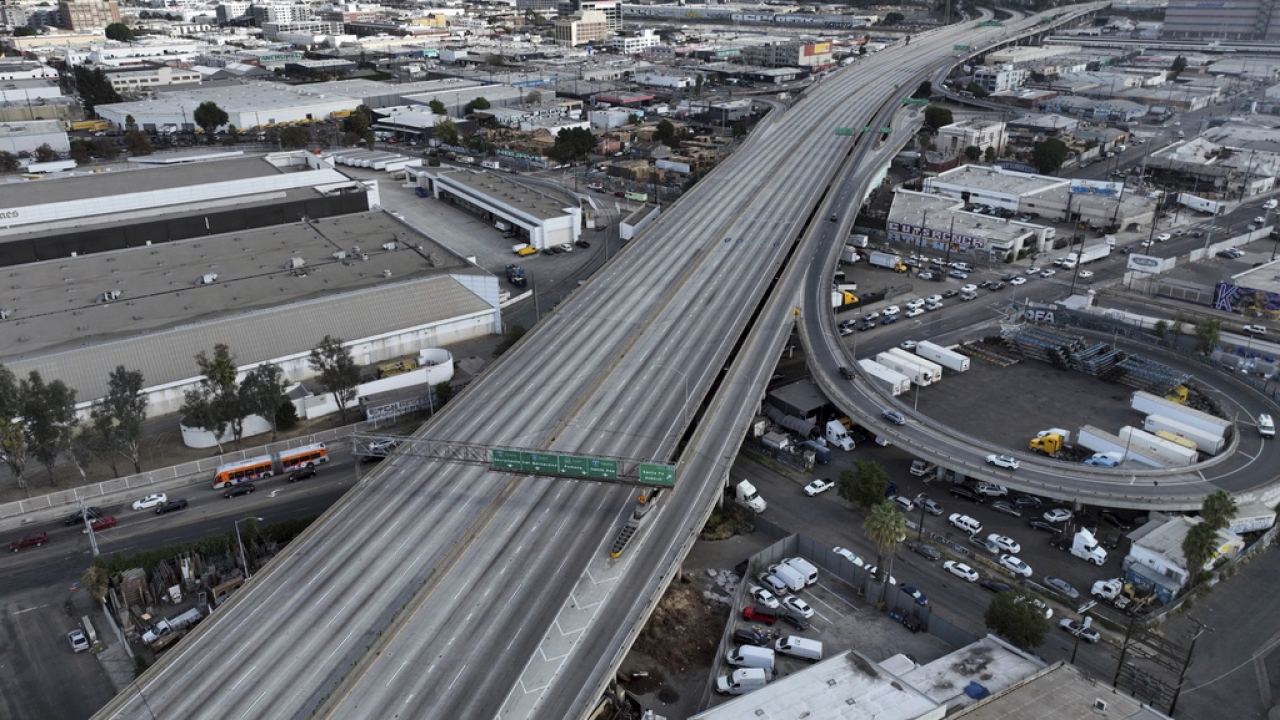 Interstate 10 in Los Angeles is closed and empty in the aftermath of a fire.