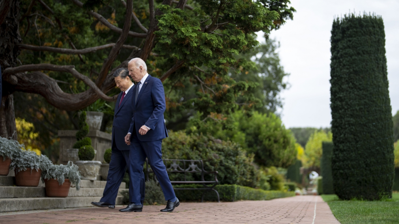 President Joe Biden and China's President President Xi Jinping walk in the gardens at the Filoli Estate in California.