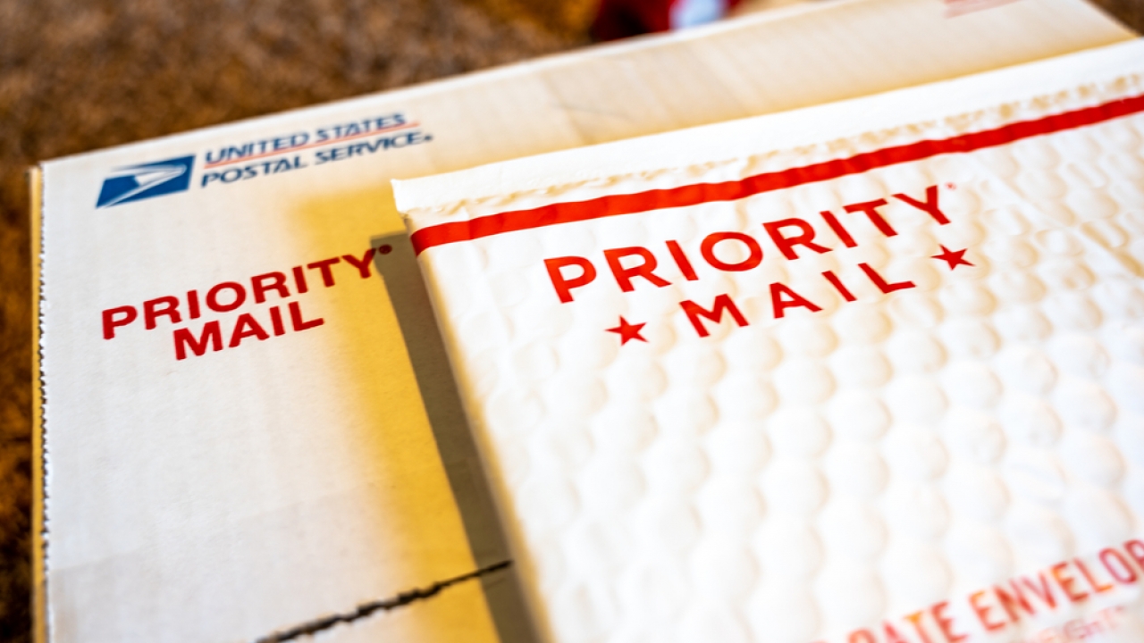 USPS priority mail envelope and box