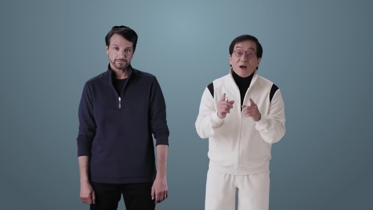 Ralph Macchio and Jackie Chan are pictured.