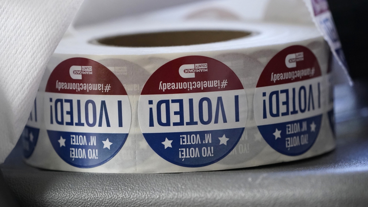 "I Voted!" stickers are shown.