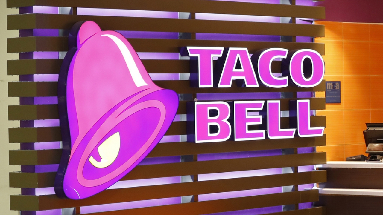 The Taco Bell logo is seen at a restaurant.