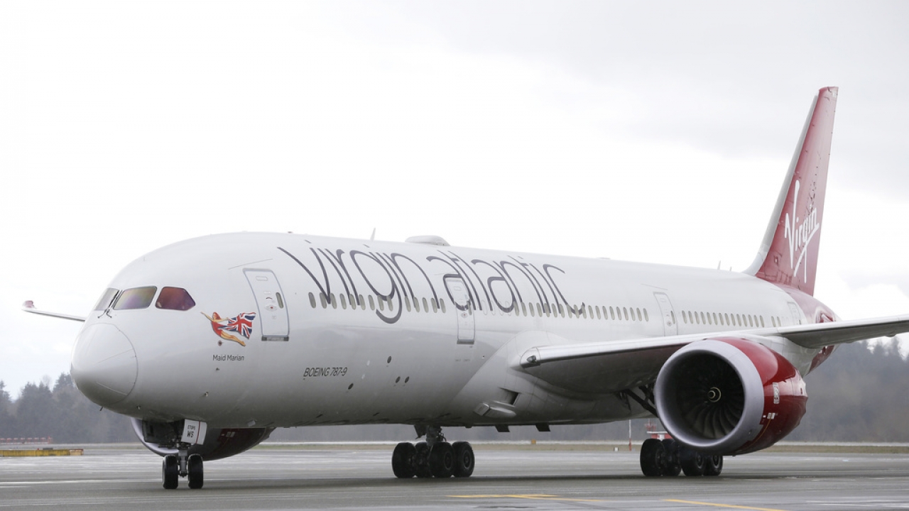 Virgin Atlantic plane arriving at an airport.