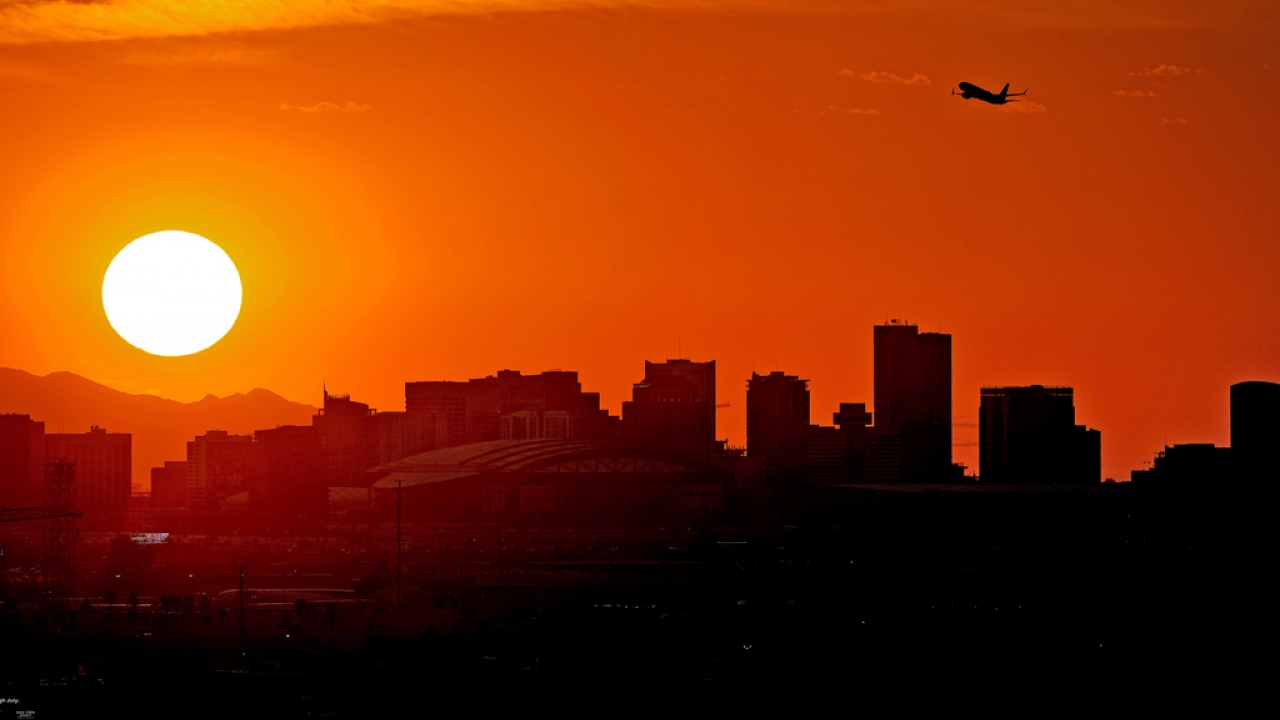 The sun sets over Phoenix.