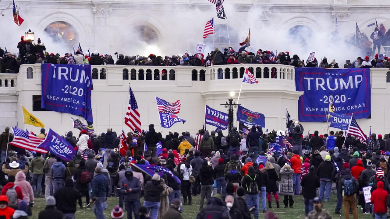 Violent rioters supporting President Donald Trump, storm the Capitol in Washington.