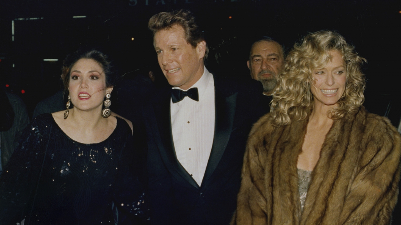 Actor Ryan O'Neal and longtime companion Farrah Fawcett arrive at the New York premiere of O'Neal's new movie, "Chances Are."